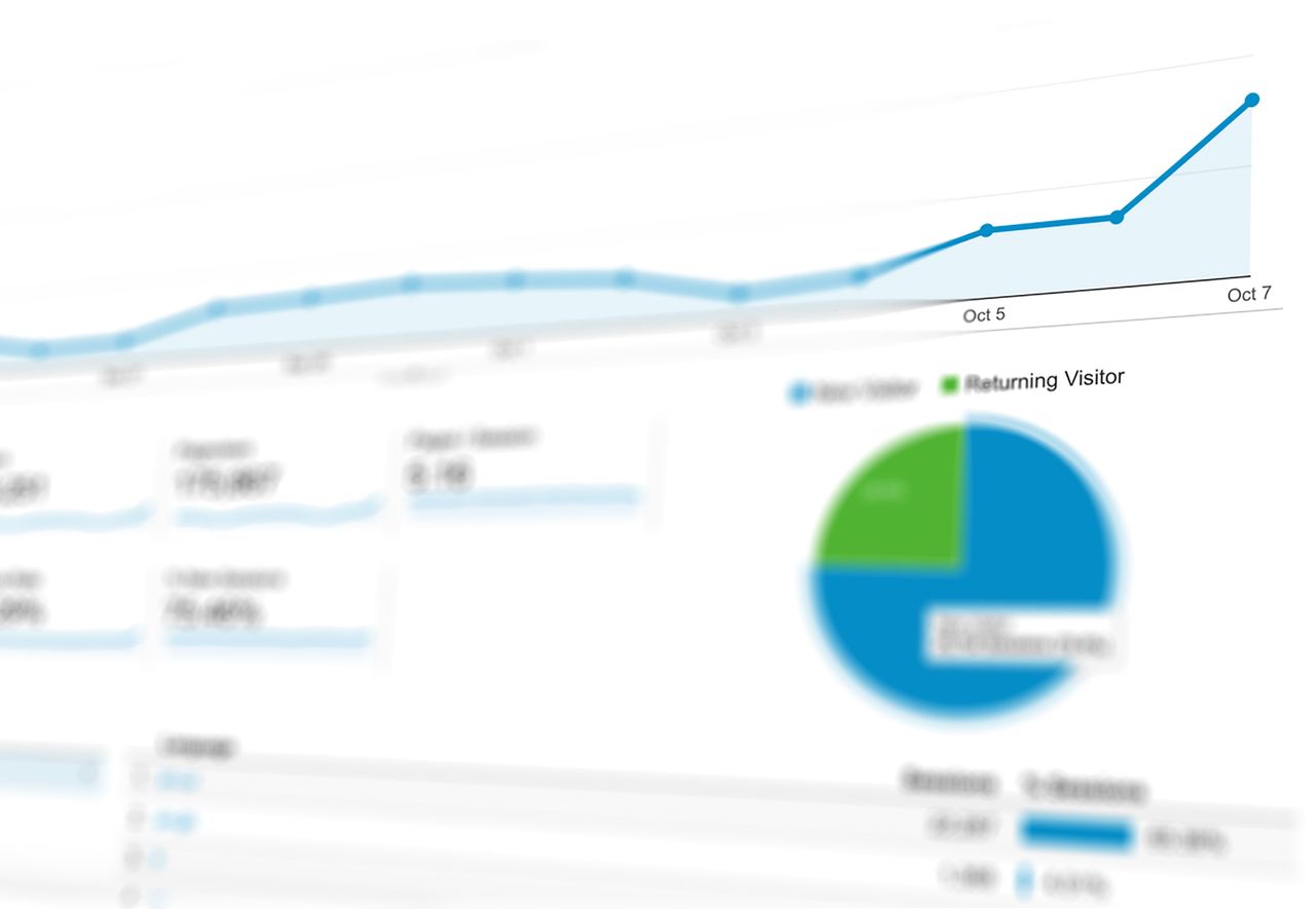 home-services-02 Abstract visualization of data analytics with graphs and charts showing dynamic growth.